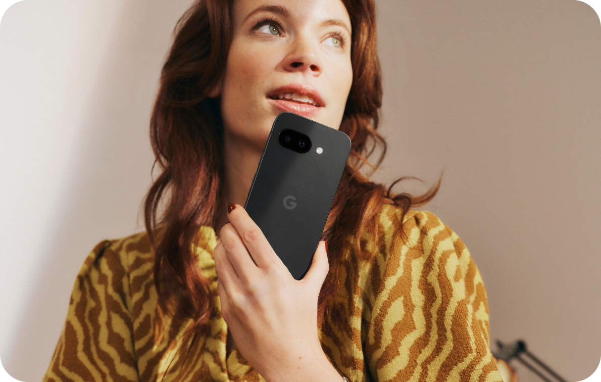 A woman working on her Google Pixel 9a phone.