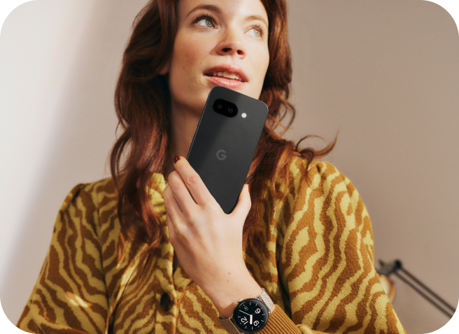 A woman working on her Google Pixel 9a phone.
