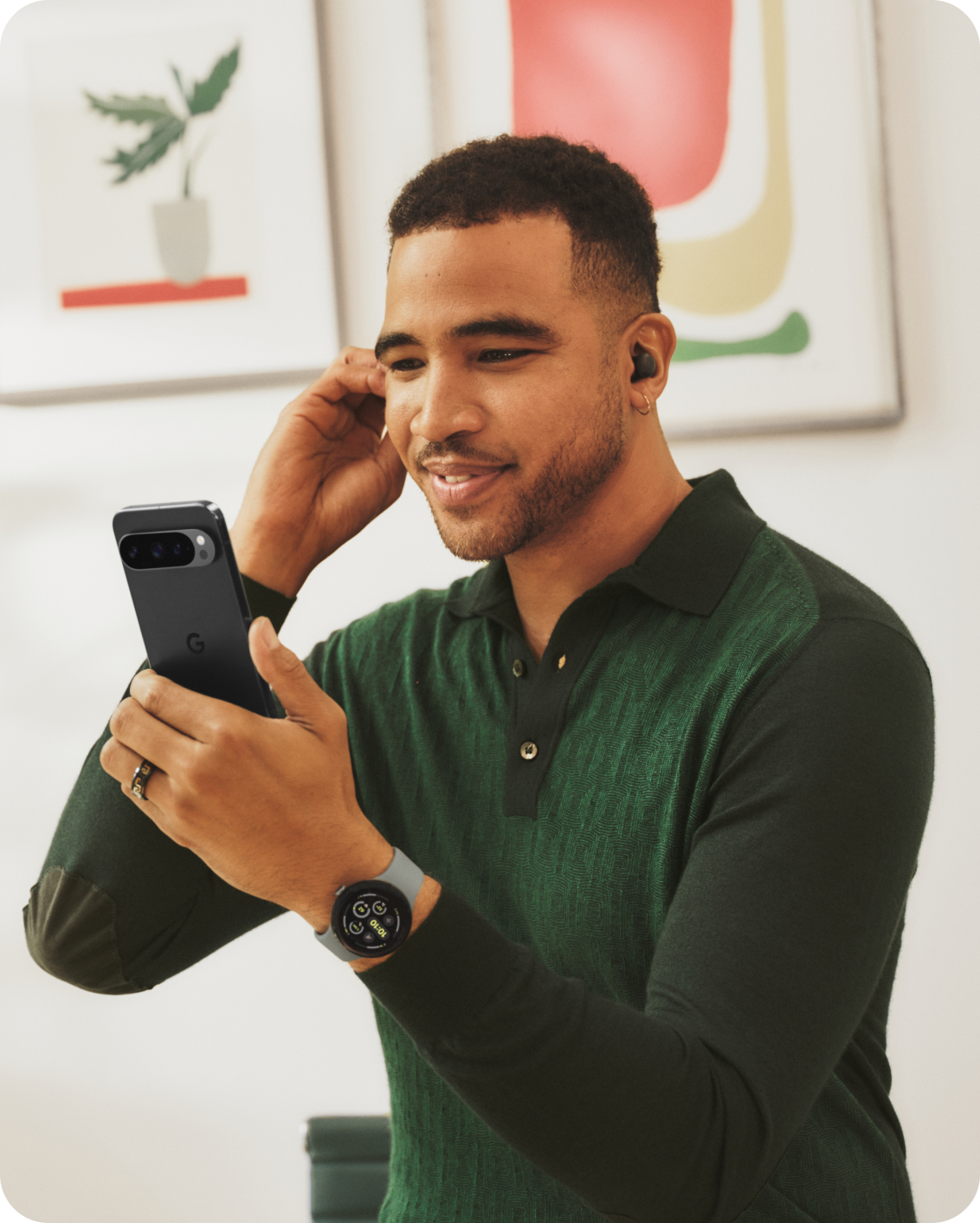 A man working on his Google Pixel 9 Pro.