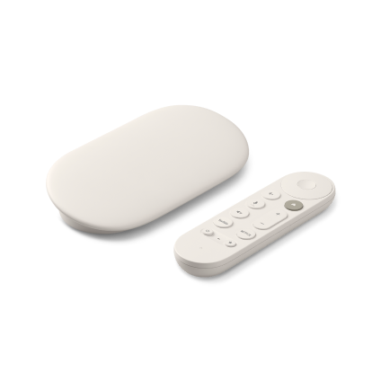 White-colored Google tv streamer with remote against a white background.
